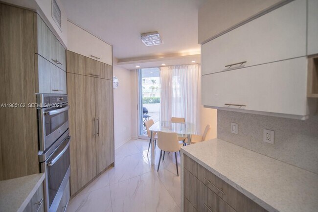 Building Photo - 16445 Collins Ave