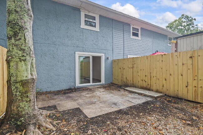 Building Photo - "Charming 2-Bedroom Townhouse Retreat with...