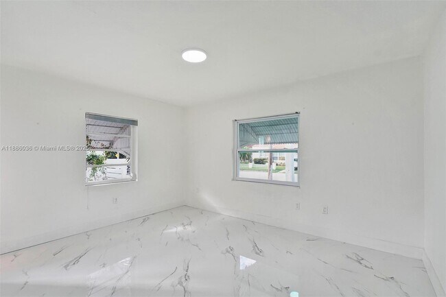 Building Photo - 9173 Byron Ave