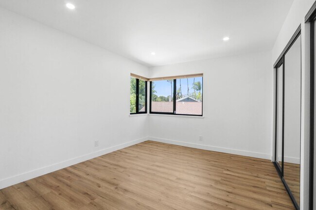 Building Photo - Renovated Lake Forest Home with Expansive Yard & Modern Finishes