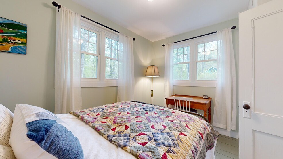 Double bed with antique iron frame headboard - 65 Ohayo Mountain Rd