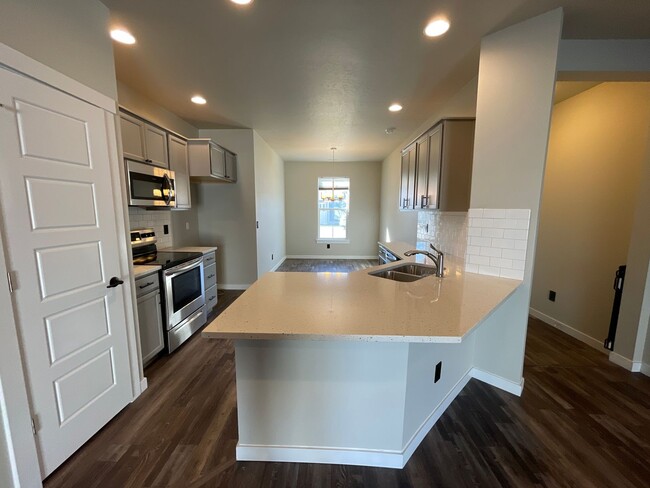 Building Photo - Newly Built 3 Bedroom Home w/ Hardwood Flo...