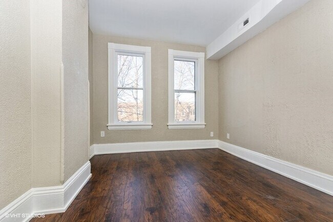 Building Photo - 11335 S Langley Ave