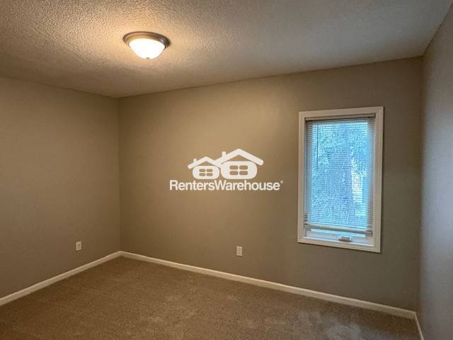 Building Photo - 8191 E River Rd