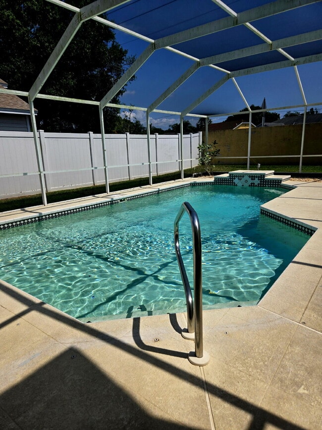 Building Photo - This 3/2 pool home is located at beautiful...