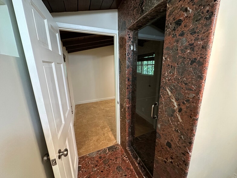 Master bath leading back to bedroom - 10809 Huston St