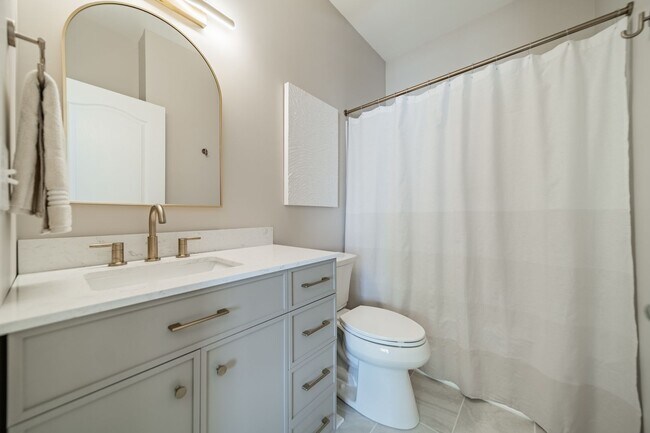 Building Photo - UPGRADES! Two Bedroom Townhouse - Six Mont...