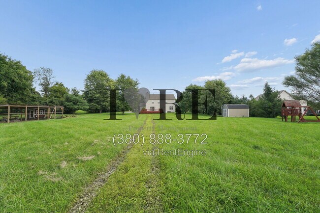 Building Photo - 8765 Hyland-Croy Rd