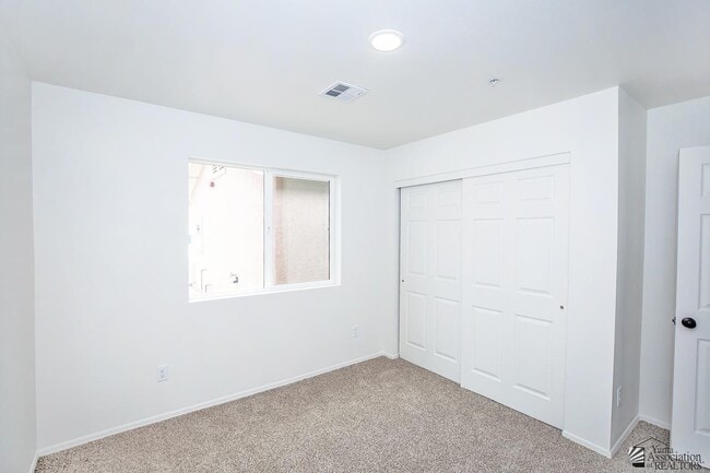 Building Photo - 7361 E 38th Ln