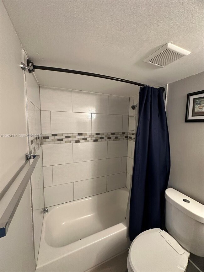 Building Photo - 9491 Palm Cir S