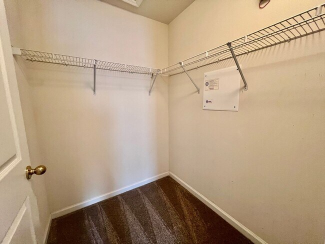 Building Photo - Gated Comfort Condo, Poolside Vibes: Your Next Home Awaits at Merrill Pines