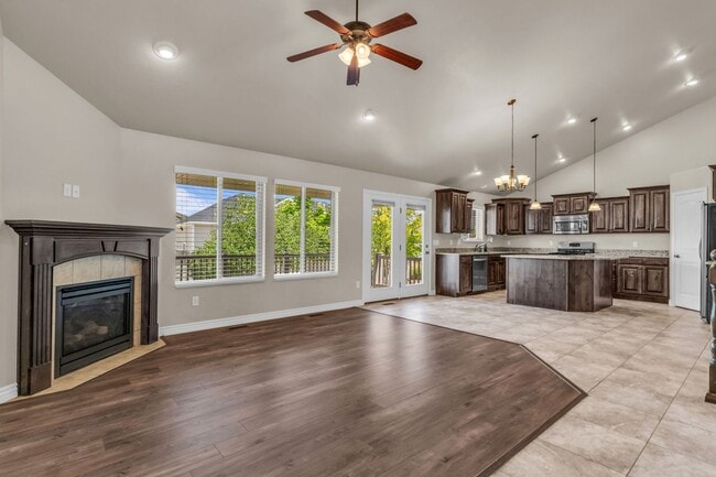 Building Photo - Spacious Syracuse Home with Covered Deck, Loft & Oversized 3-Car Garage