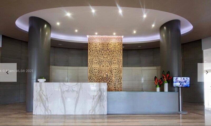 Building Photo - 10275 Collins Ave