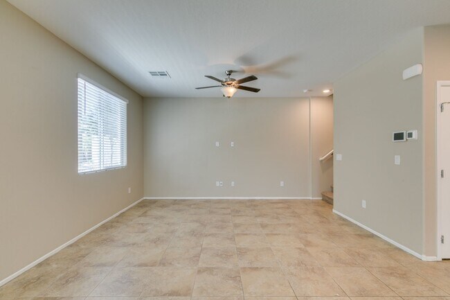 Building Photo - Spacious Townhouse with Loft & Rare 3-Car Garage!