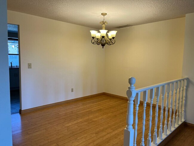 Building Photo - Beautiful One-Level Home with Sunroom, Vaulted Ceilings & Multiple Living Areas