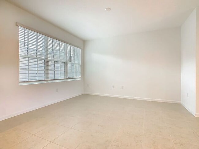 Building Photo - New Luxury Townhome in Celebration, FL Corner unit. All porcelain tiled floors. Aleutian model by...