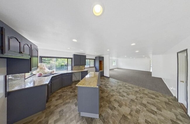 Building Photo - Spacious 4-Bedroom Home with Stunning Hill...