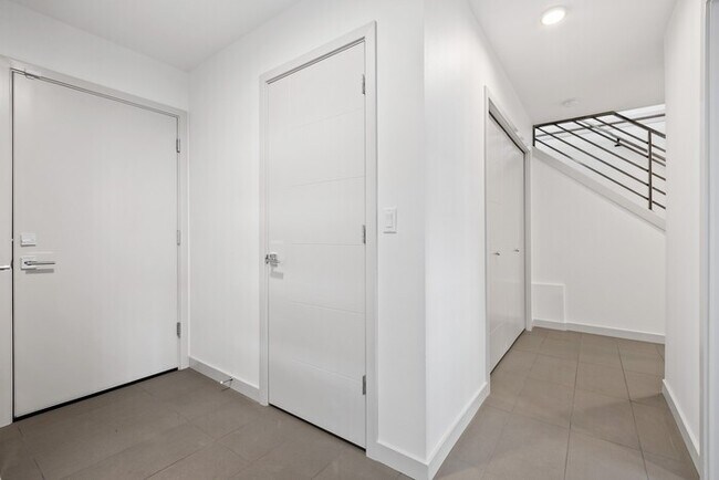 Building Photo - Impeccable Greenwood Townhome with Air Con...