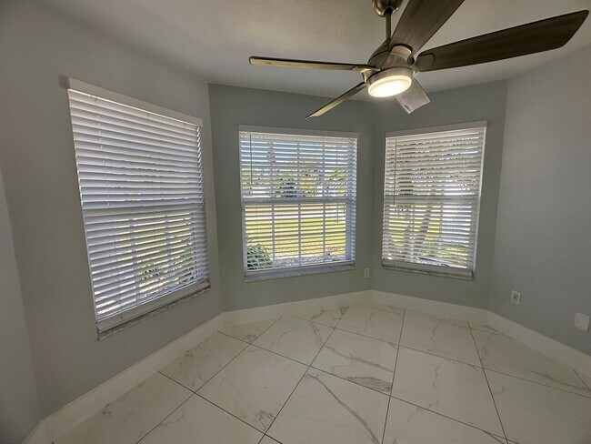 Building Photo - Stunning 3 Bedroom + Den Home with Fence + Screened Lanai in Great Location!