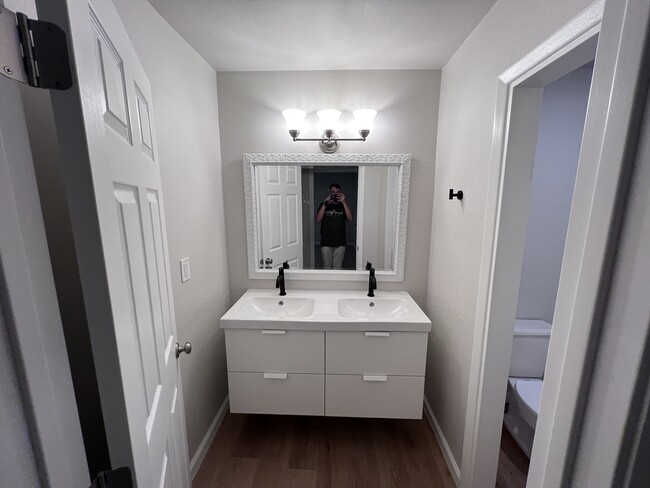 Upstairs bathroom double vanity - 7602 N 61st Ave