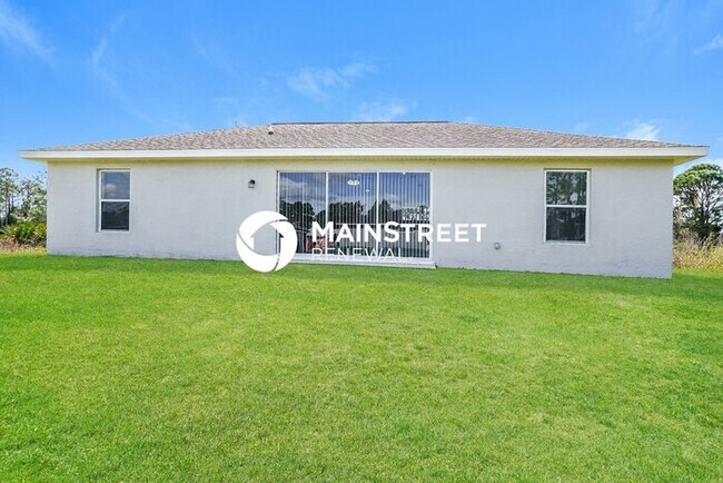 Building Photo - 3 Bedroom Pet-Friendly Home in LEHIGH ACRES, FL with Main Street Renewal