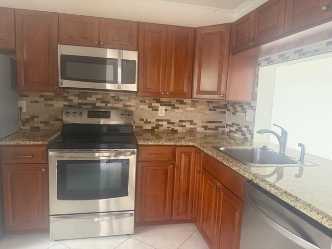 Building Photo - 3050 NW 42nd Ave