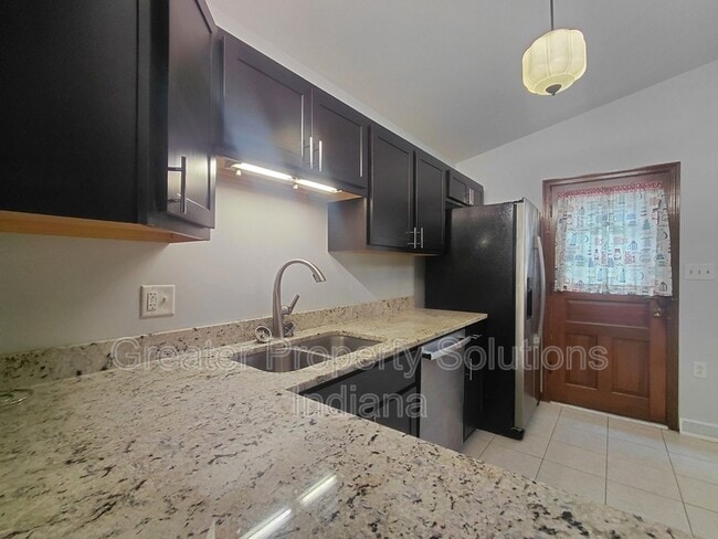 Building Photo - 2312 W 65th Ave
