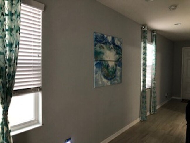 Building Photo - PRATICALLY BRAND NEW HOME IN GATED COMMUNITY!