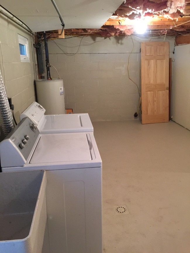 Laundry/storage area on other side of wall from finished basement - 503 Center St