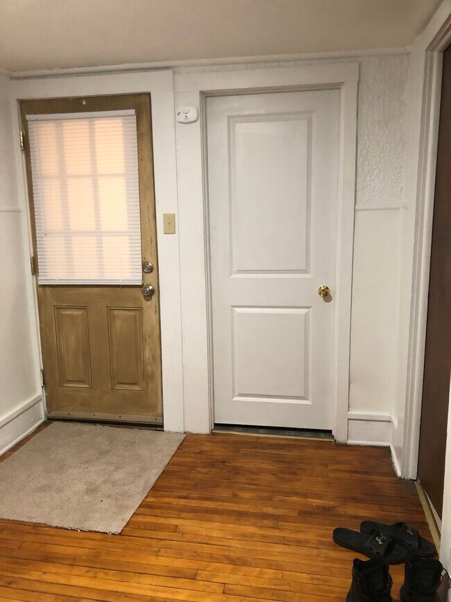 Entry door on left, large bedroom door right - 416 Henry St