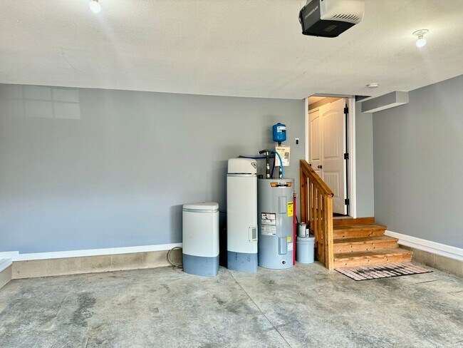 Building Photo - Large Open 4 Bedroom Home with Bonus! Tree Lined Backyard with Privacy Fence!