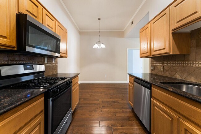 Building Photo - Upgraded condo in gated community