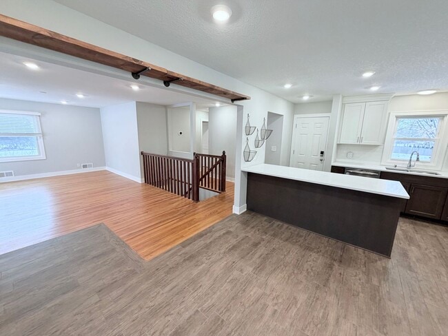 Building Photo - Spacious 4-Bedroom Home with Pond Views & EV-Ready Garage – Bloomington!!