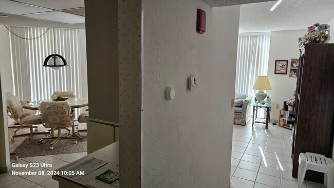 Building Photo - Furnished 3rd Floor Condo Overlooking The Golf Course