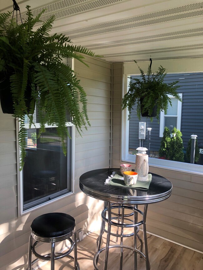 Front porch, overlooks the park. Great river and City views. - 222 6th Ave SE