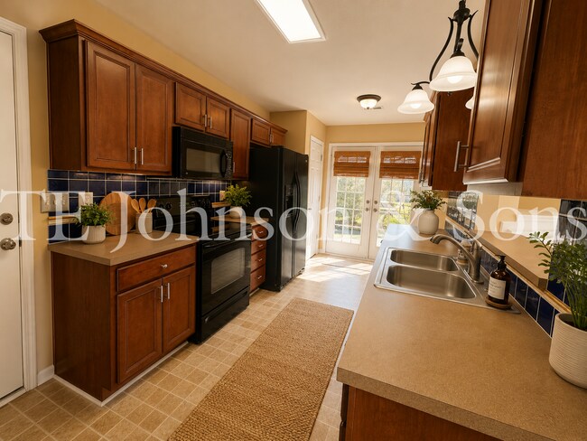 Building Photo - Spacious 3 Bedroom Home with Primary Suite on Main, Gas Fireplace & Patio in Advance!