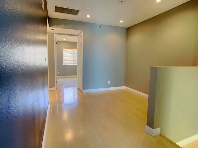 Building Photo - A Beautiful updated trilevel townhome in W Figueroa is now available for rent.