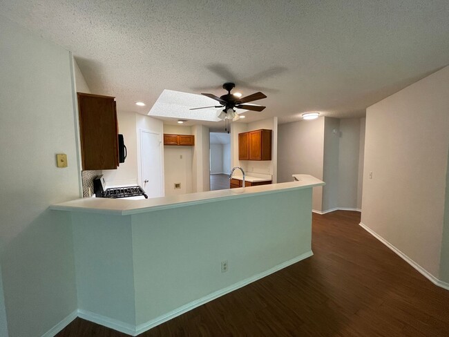 Building Photo - SPACIOUS HOME - NEW FLOORING! - 2 LIVING A...