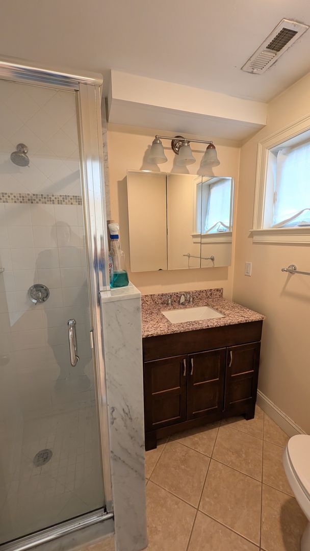 Building Photo - Spacious Townhouse: 4-bed, 3.5 bath unit in Brighton with Garage Parking
