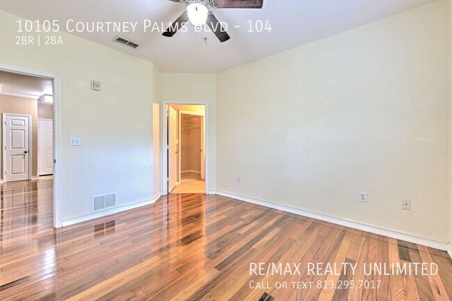 Building Photo - 10105 Courtney Palms Blvd