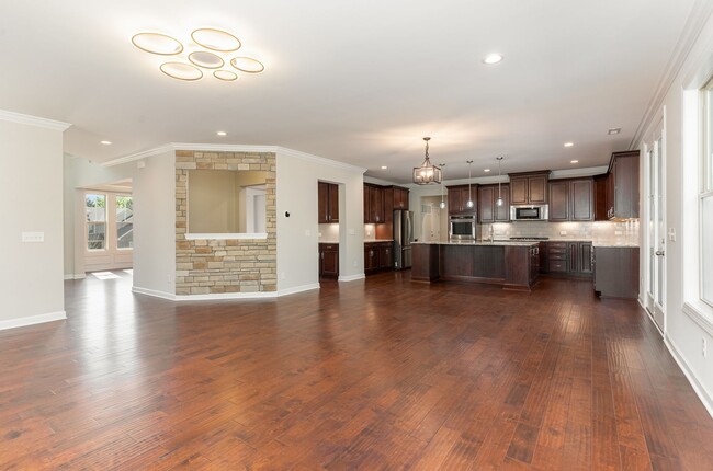 Building Photo - Gorgeous 5 Bedroom Home with First Floor I...