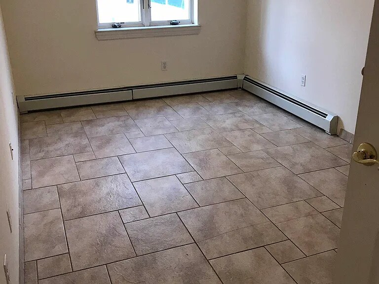 Building Photo - 142-37 38th Ave