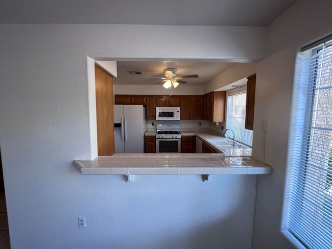 Building Photo - TWO BEDROOM CONDO WITH TWO CAR GARAGE IN H...