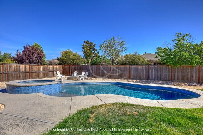 Building Photo - Practically New & Ready for Summer Fun!