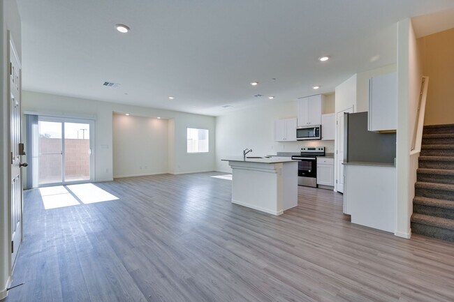 Building Photo - NW 3 Bedroom Townhouse!! Gated Community Pool!! 2 Car Garage!!! No Carpet downstairs.