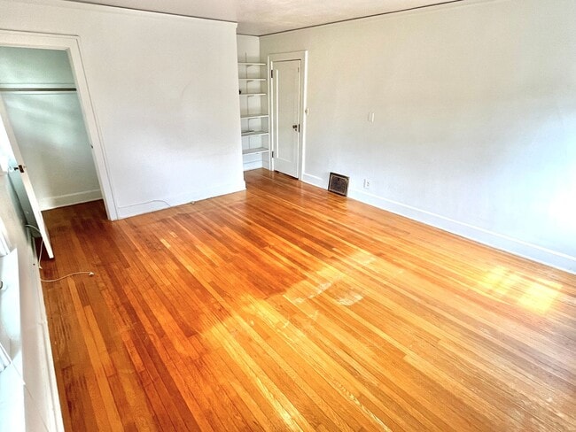 Building Photo - Grant Park 3-Story with Hardwoods, Huge Deck, Detached Garage, and Tons of Character