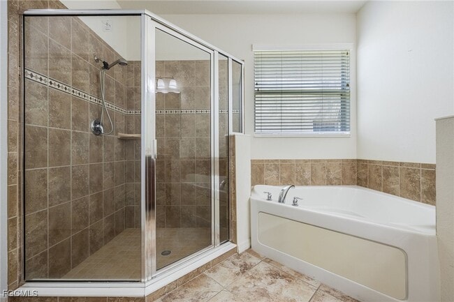 Building Photo - 16530 Whispering Trace Ct