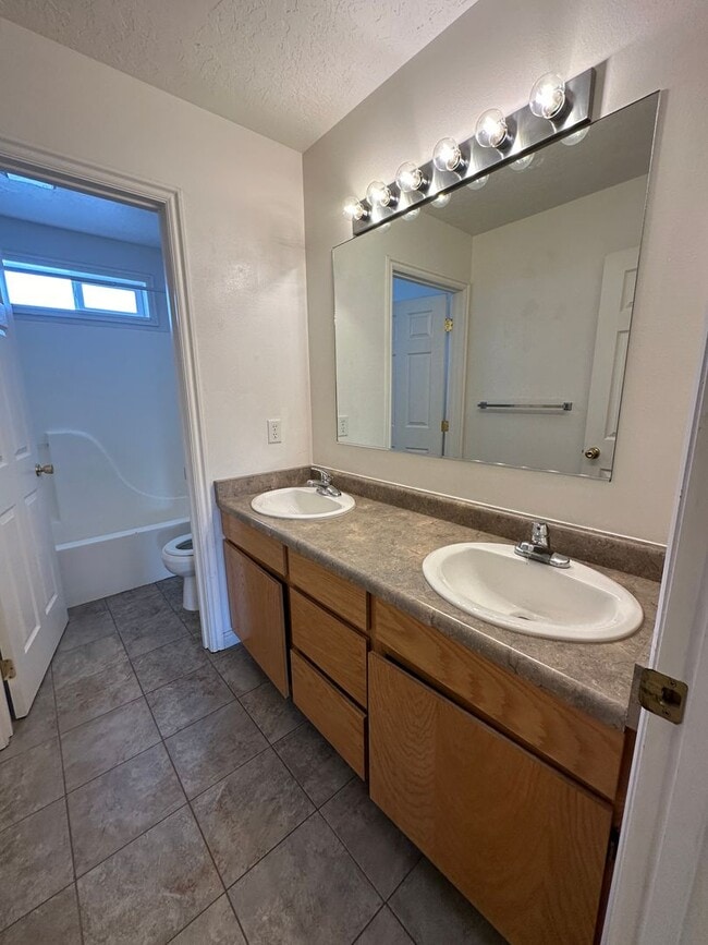 Building Photo - Discover Modern Comfort at The Meadows: Month-to-Month Lease!