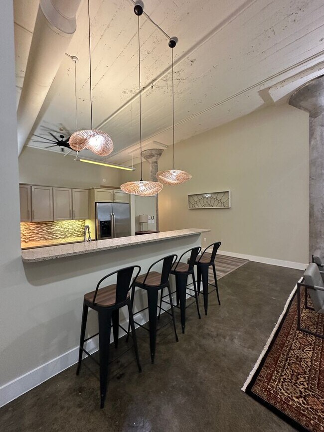 Building Photo - 1 BR/ 1BA at The Lofts with GATED GARAGE P...