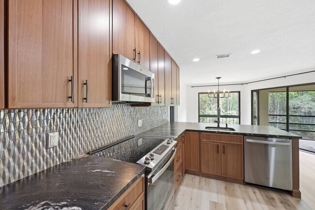 Building Photo - 8753 Como Lake Dr